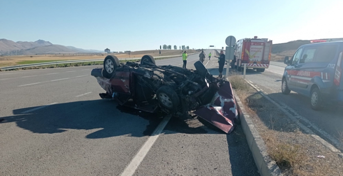 Takla atan otomobilden 8 metre uzağa fırladı